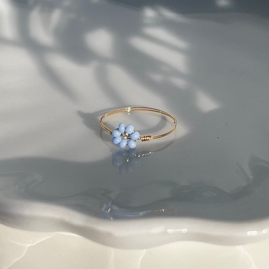 Golden flower ring